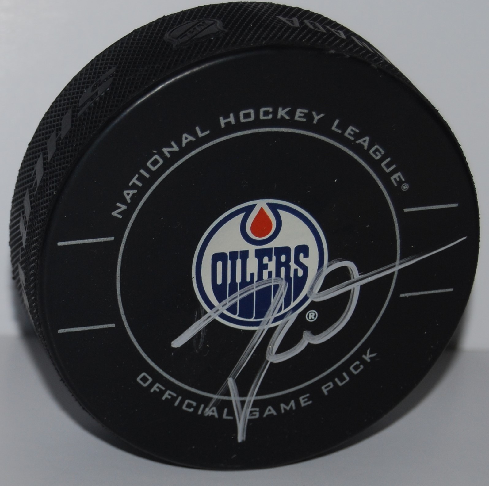 TAYLOR HALL signed (EDMONTON OILERS) Official game hockey puck W/COA #2 Collectible Memorabilia