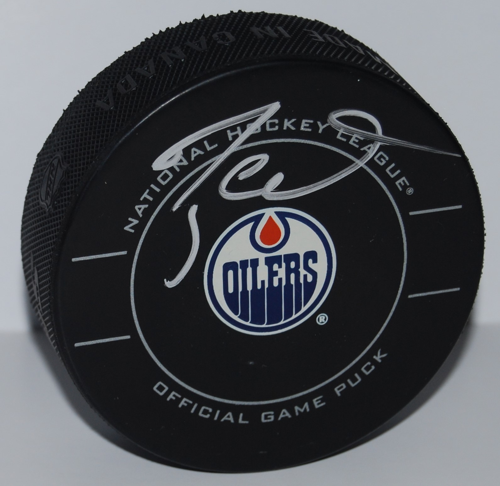 TAYLOR HALL signed (EDMONTON OILERS) Official game hockey puck W/COA #1 Collectible Memorabilia