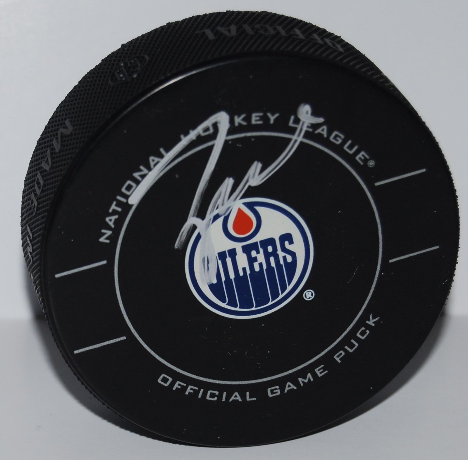 TAYLOR HALL signed (EDMONTON OILERS) Official game hockey puck W/COA #4 Collectible Memorabilia