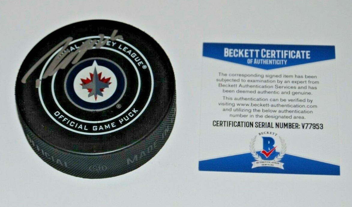 PATRICK LAINE signed (WINNIPEG JETS) Official game hockey puck BECKETT BAS Collectible Memorabilia