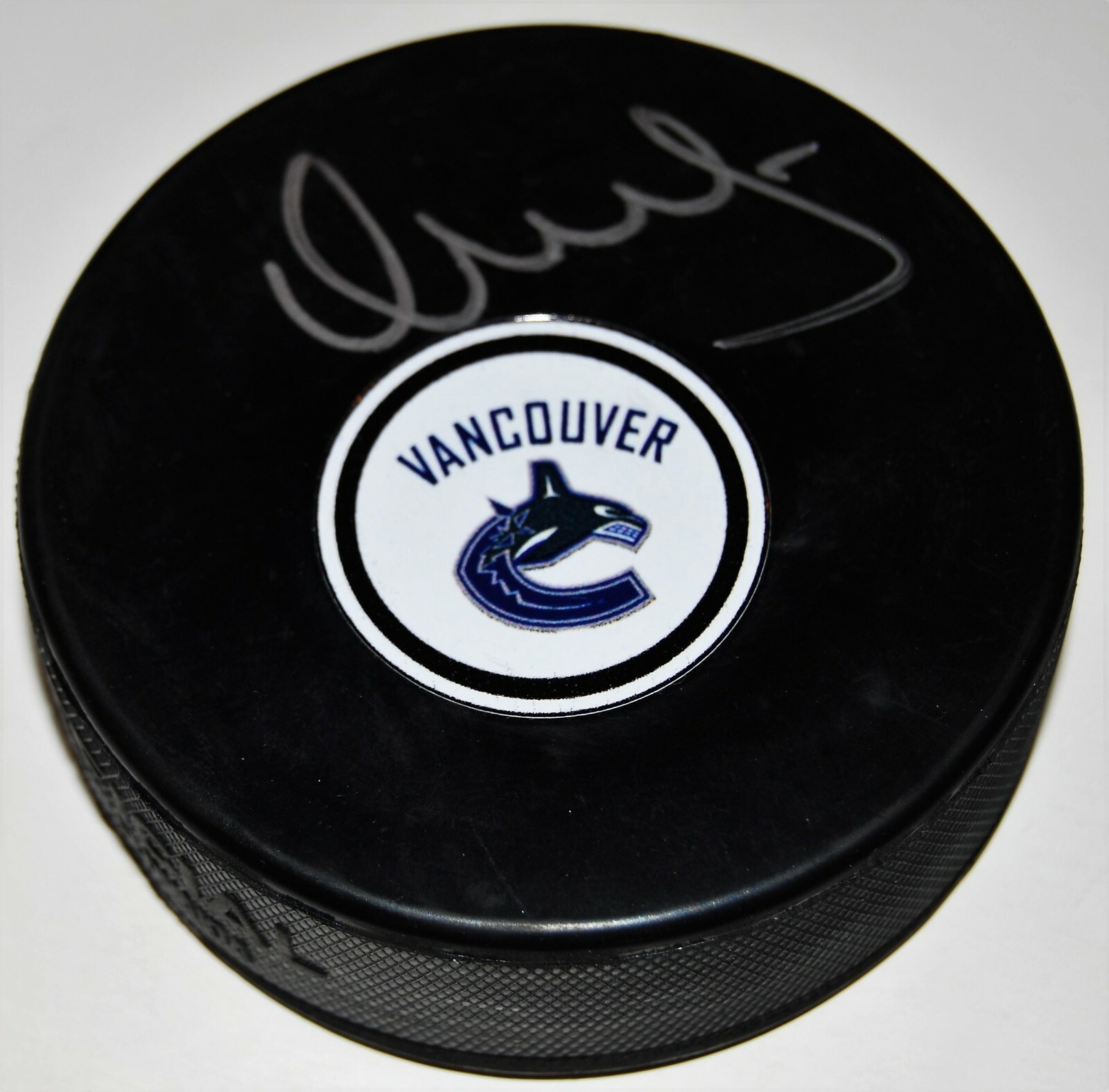 VASILY PODKOLZIN signed (VANCOUVER CANUCKS) autographed hockey puck W/COA Collectible Memorabilia