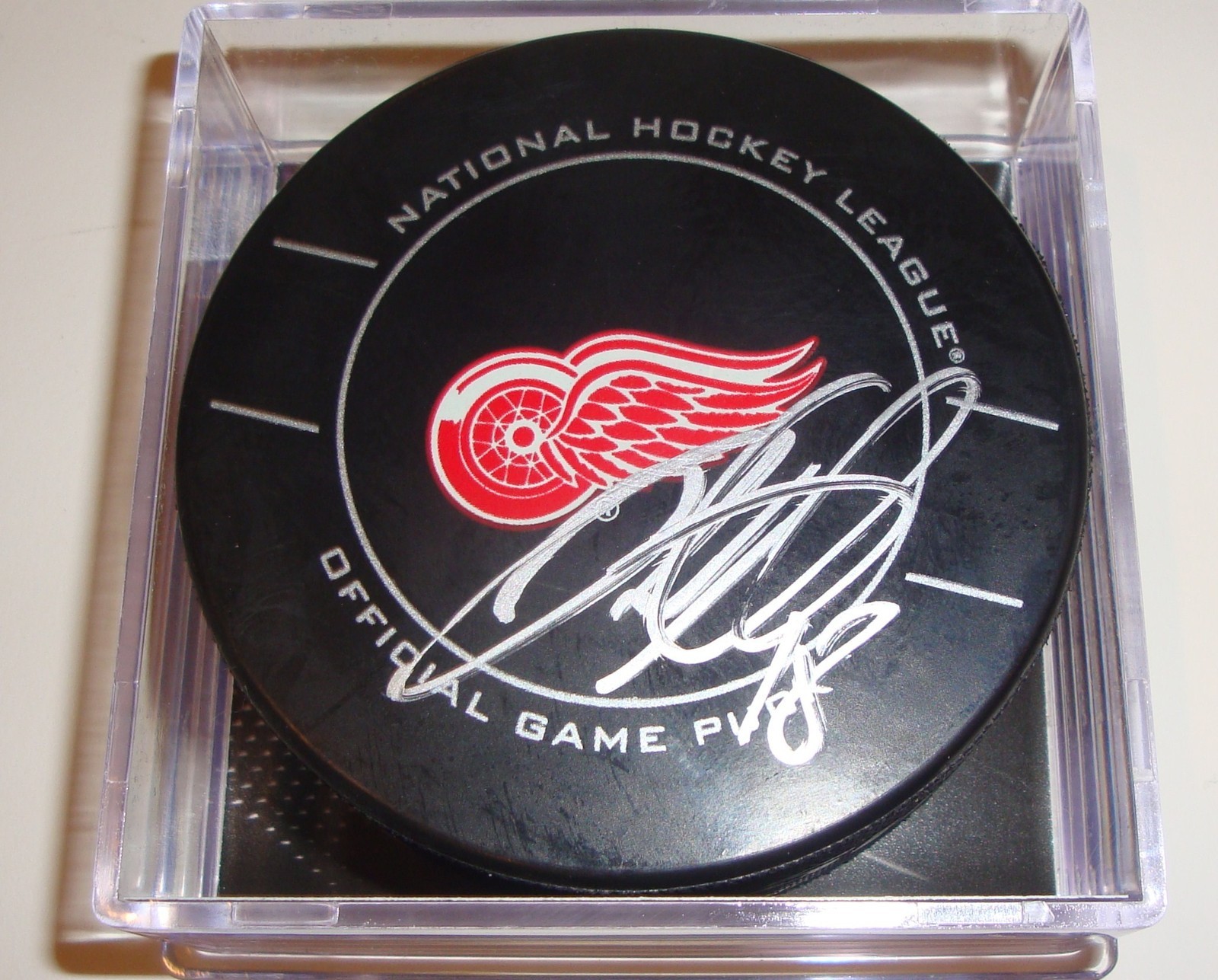 Ian White Signed Puck w/COA Detroit Red Wings Official Game Puck Collectible Memorabilia