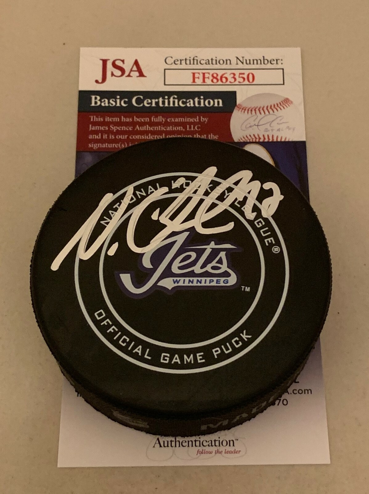Nikolaj Ehlers signed Winnipeg Jets Wordmark Official Game Puck autographed JSA Collectible Memorabilia