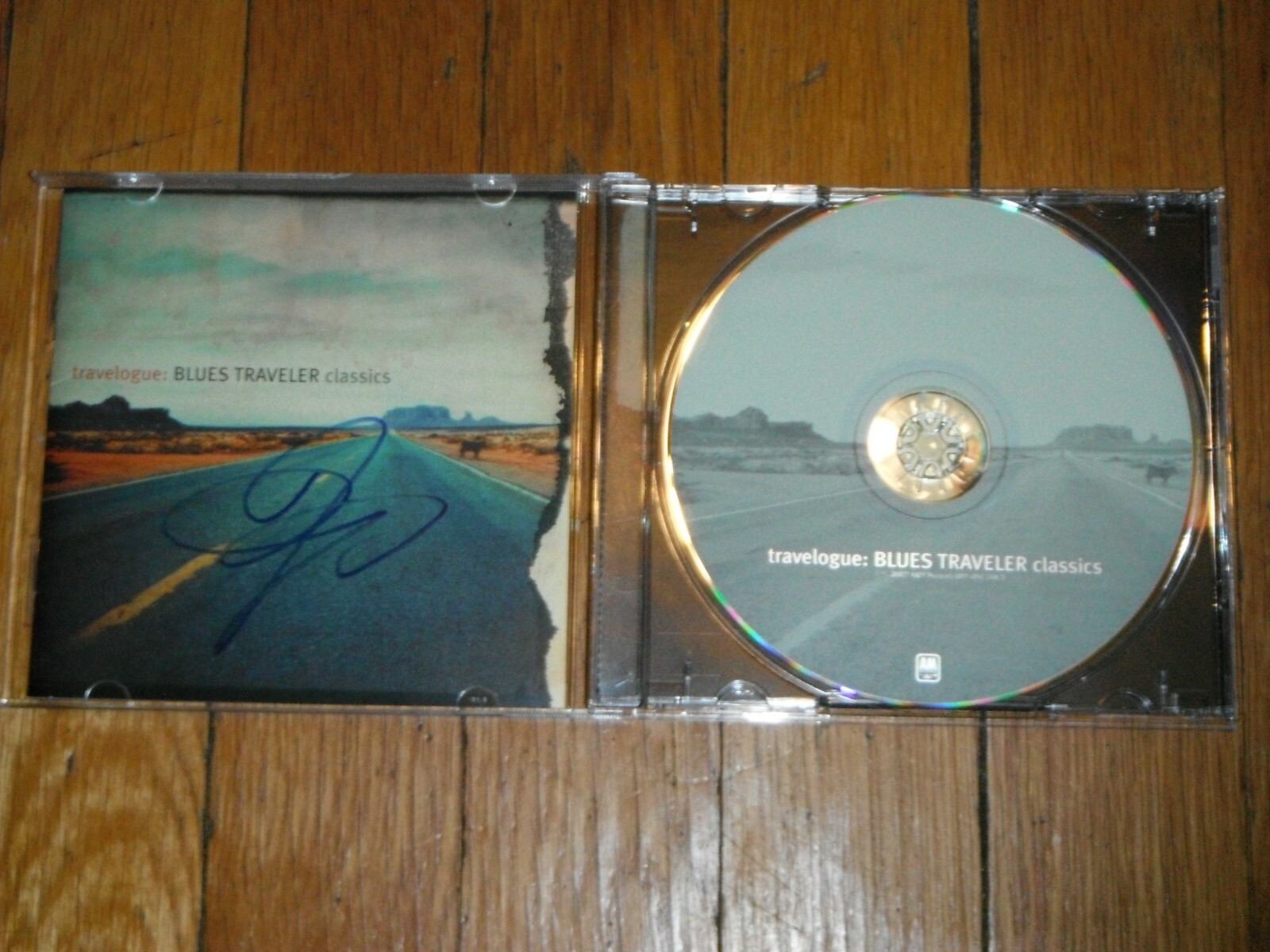 BLUES TRAVELER JOHN POPPER SIGNED TRAVELOGUE CD COVER Collectible Memorabilia