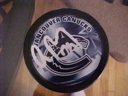 VANCOUVER CANUCKS AARON ROME SIGNED PUCK Collectible Memorabilia