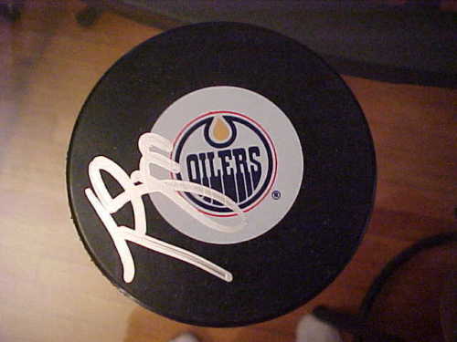 EDMONTON OILERS TOM GILBERT SIGNED PUCK Collectible Memorabilia