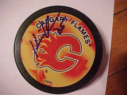 CALGARY FLAMES HENRIK KARLSSON SIGNED PUCK Collectible Memorabilia