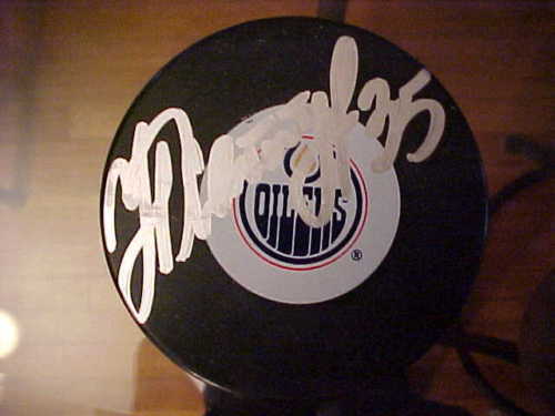 EDMONTON OILERS NIKOLAI KHABIBULIN SIGNED PUCK Collectible Memorabilia