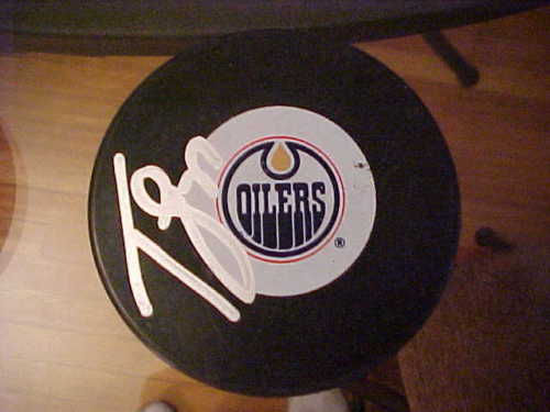 EDMONTON OILERS TOM GILBERT SIGNED PUCK Collectible Memorabilia