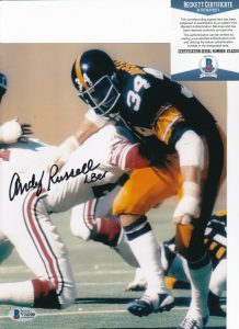 ANDY RUSSELL SIGNED (PITTSBURGH STEELERS) FOOTBALL 8X10 PHOTO BECKETT V24200  COLLECTIBLE MEMORABILIA