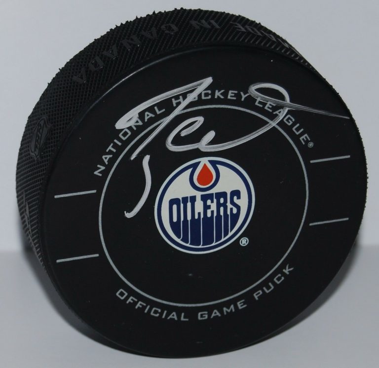 TAYLOR HALL SIGNED (EDMONTON OILERS) OFFICIAL GAME HOCKEY PUCK W/COA #1  COLLECTIBLE MEMORABILIA