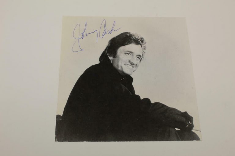 Johnny Cash sold Giant Hits Signed CD Country Rock Autographed Ring of Fire