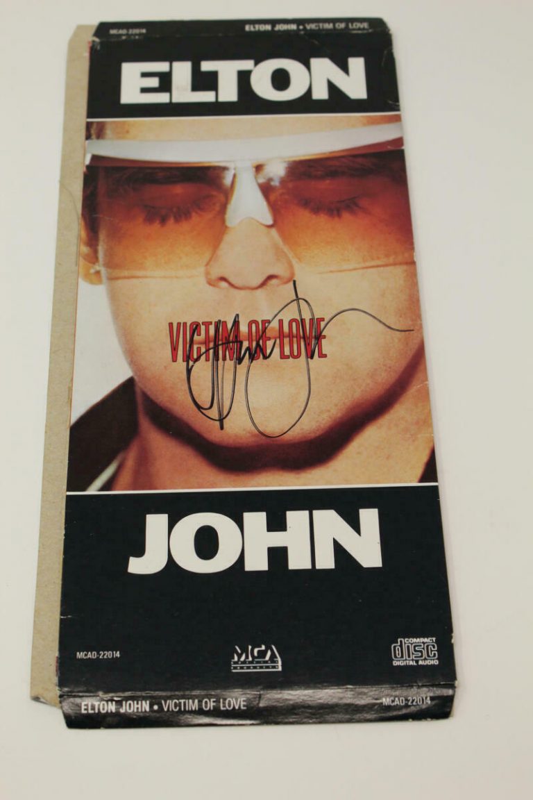 ELTON JOHN SIGNED AUTOGRAPH “VICTIM OF LOVE” CD SET – ROCKETMAN STAR, MUSIC ICON  COLLECTIBLE MEMORABILIA