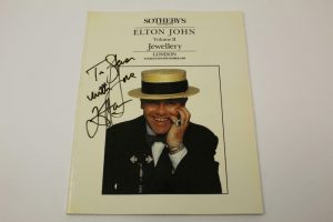 SIR ELTON JOHN SIGNED AUTOGRAPH SOTHEBY’S AUCTION CATALOG – VERY RARE MUSIC ICON  COLLECTIBLE MEMORABILIA