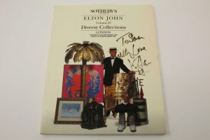 SIR ELTON JOHN SIGNED AUTOGRAPH SOTHEBY’S AUCTION CATALOG – CAPTAIN FANTASTIC  COLLECTIBLE MEMORABILIA