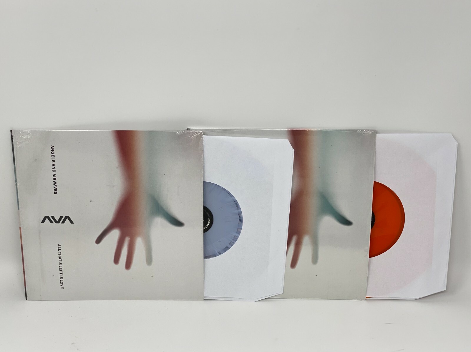 ANGELS AND AIRWAVES ALL THAT’S LEFT IS LOVE 7″ VINYL CLEAR WHITE SPLATTER ORANGE  COLLECTIBLE MEMORABILIA