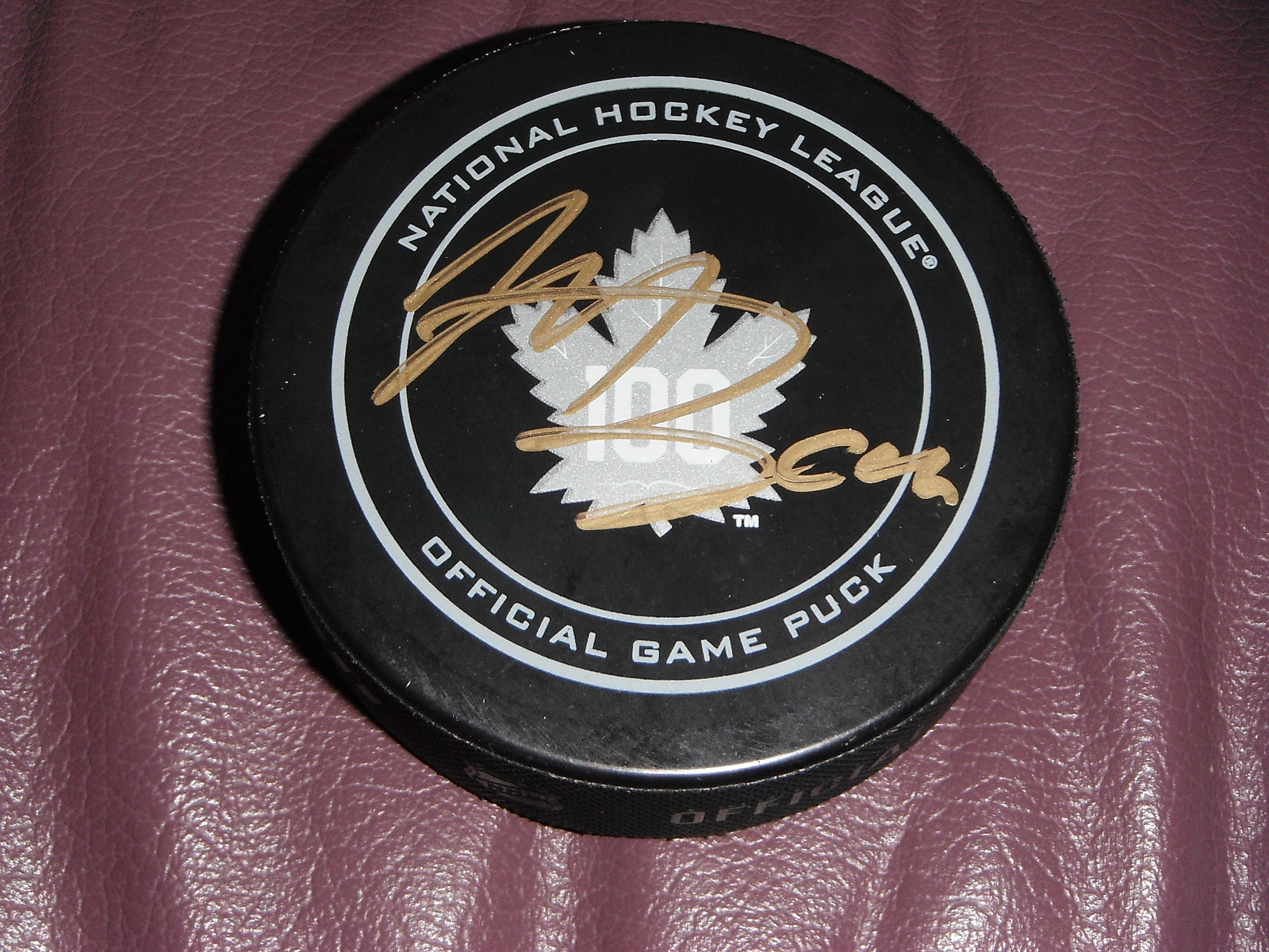 TORONTO MAPLE LEAFS MORGAN RIELLY SIGNED 100TH ANNIVERSARY GAME PUCK Collectible Memorabilia
