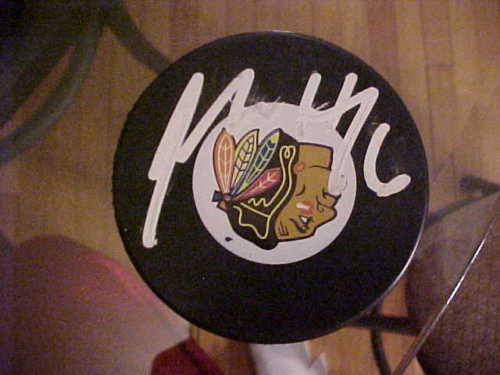 CHICAGO BLACKHAWKS JORDAN HENDRY SIGNED PUCK Collectible Memorabilia