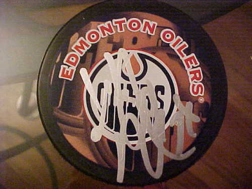 EDMONTON OILERS KURTIS FOSTER SIGNED PUCK Collectible Memorabilia