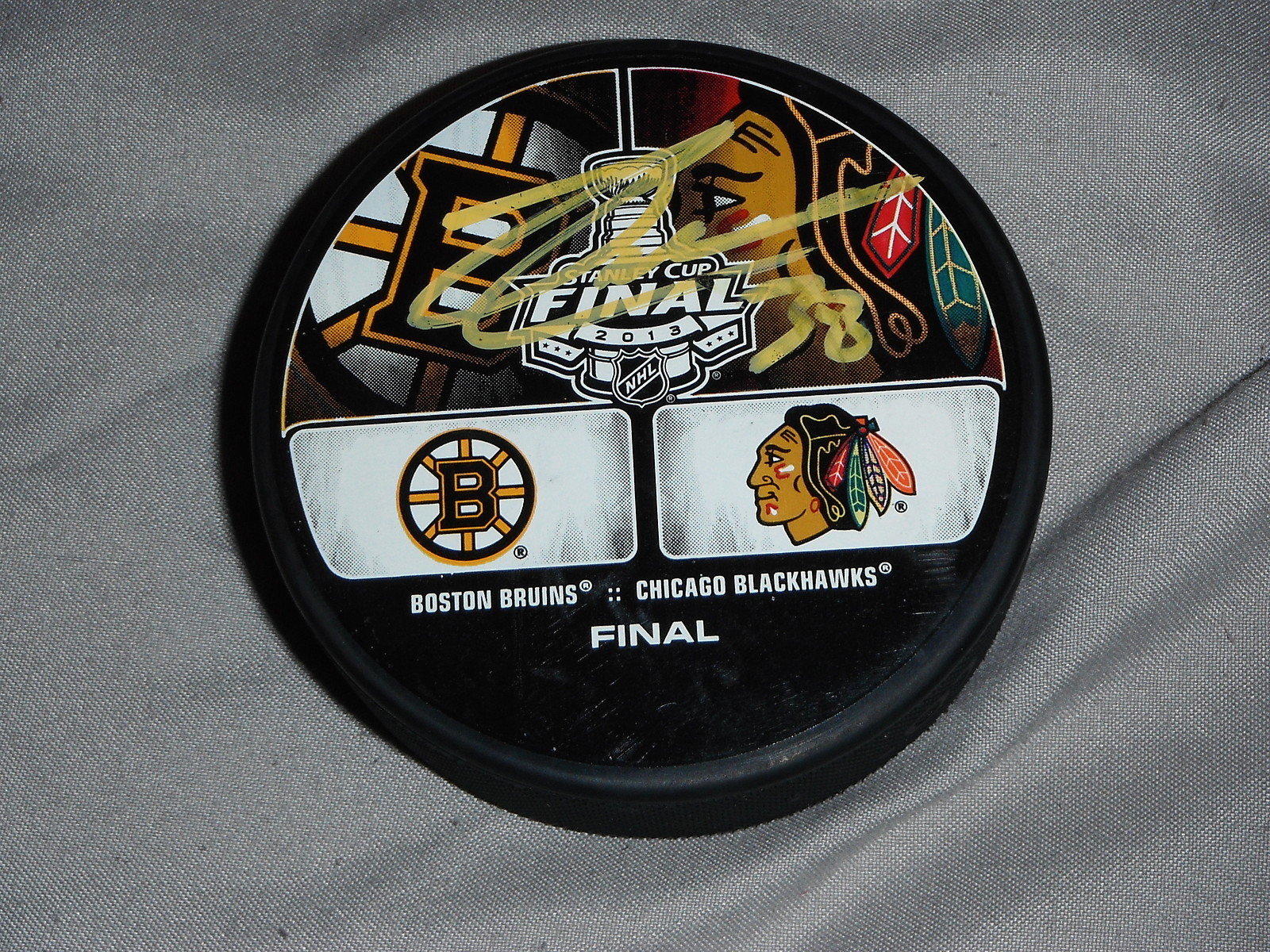 2013 BOSTON BRUINS JORDAN CARON SIGNED STANLEY CUP PUCK  COLLECTIBLE MEMORABILIA