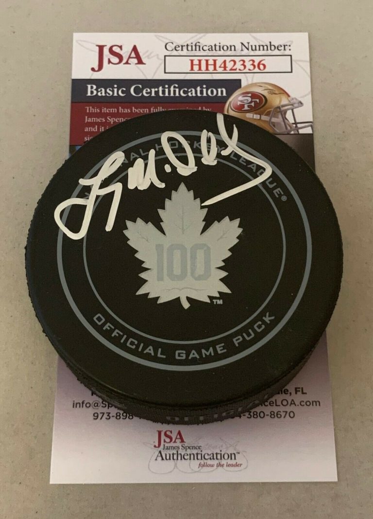 LANNY MCDONALD SIGNED TORONTO MAPLE LEAFS 100TH ANNIVERSARY GAME PUCK JSA  COLLECTIBLE MEMORABILIA