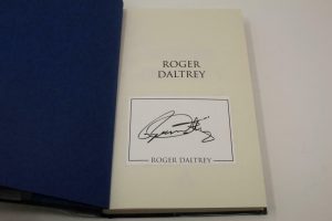 ROGER DALTREY SIGNED AUTOGRAPH “THANKS A LOT MR KIBBLEWHITE” BOOK – THE WHO  COLLECTIBLE MEMORABILIA