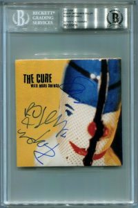THE CURE SIGNED AUTOGRAPHED WILD MOOD SWINGS CD COVER BECKETT (BAS) ROBERT SMITH  COLLECTIBLE MEMORABILIA