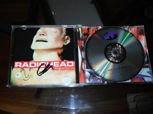 RADIOHEAD GROUP (2 MEMBERS) SIGNED THE BENDS CD COVER  COLLECTIBLE MEMORABILIA