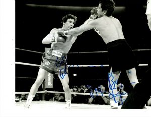 BOXING CHAMPION RAY MANCINI SIGNED THROWING PUNCH 8X10  COLLECTIBLE MEMORABILIA