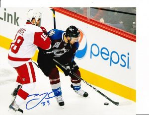 COLORADO AVALANCHE TJ GALIARDI SIGNED WORKING THE BOARDS 8X10  COLLECTIBLE MEMORABILIA