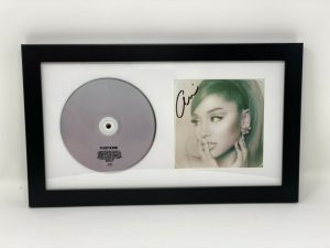 ARIANA GRANDE SIGNED “POSITIONS” FRAMED CD BOOKLET AUTOGRAPH AUTO AUTHENTIC  COLLECTIBLE MEMORABILIA