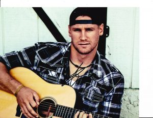 CHASE RICE SIGNED POSED WITH GUITAR 8X10  COLLECTIBLE MEMORABILIA