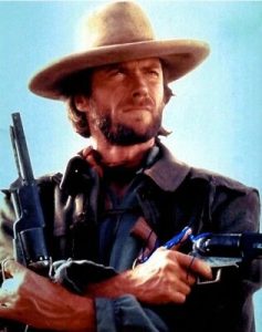 CLINT EASTWOOD SIGNED 11X14 OUTLAW JOSEY WALES PHOTO W/ HOLOGRAM COA  COLLECTIBLE MEMORABILIA