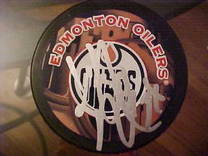 EDMONTON OILERS KURTIS FOSTER SIGNED PUCK  COLLECTIBLE MEMORABILIA