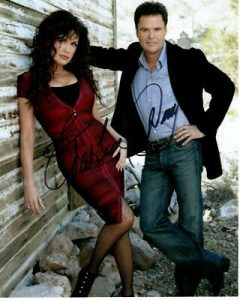 DONNY AND MARIE OSMOND SIGNED PHOTO W/ HOLOGRAM COA  COLLECTIBLE MEMORABILIA