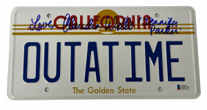 CLAUDIA WELLS SIGNED LICENSE PLATE BACK TO THE FUTURE OUTATIME AUTOGARPH BECKETT COLLECTIBLE MEMORABILIA