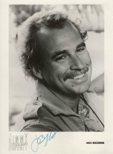 JIMMY BUFFETT SIGNED AUTOGRAPH 8X10 PHOTO – MARGARITAVILLE SINGER, VERY RARE JSA COLLECTIBLE MEMORABILIA