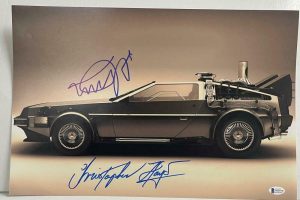 MICHAEL J FOX CHRISTOPHER LLOYD SIGNED BACK TO THE FUTURE 12X18 PHOTO BECKETT D COLLECTIBLE MEMORABILIA