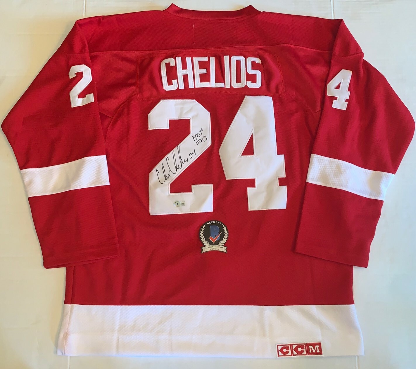 NEW LISTINGChris Chelios signed Detroit Red Wings jersey HOF Inscription Beckett Witnessed