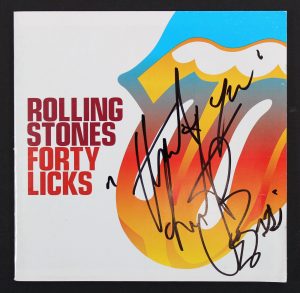CHARLIE WATTS ROLLING STONES AUTHENTIC SIGNED FORTY LICKS CD COVER BAS #AA00660 COLLECTIBLE MEMORABILIA