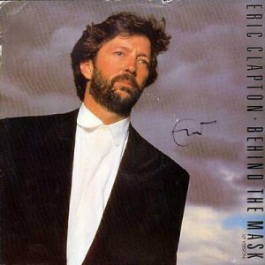 ERIC CLAPTON AUTOGRAPHED BEHIND THE MASK SIGNED LP ALBUM COLLECTIBLE MEMORABILIA