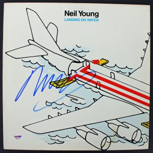 NEIL YOUNG AUTHENTIC SIGNED LANDING ON WATER ALBUM COVER PSA/DNA #AA84129 COLLECTIBLE MEMORABILIA
