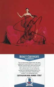 SELENA GOMEZ SIGNED (REVELACION) CD COVER 5X5 CARD W/CD BECKETT BAS Y75657 COLLECTIBLE MEMORABILIA