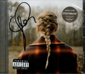 TAYLOR SWIFT SIGNED AUTOGRAPHED EVERMORE CD INSERT BOOKLET COLLECTIBLE MEMORABILIA