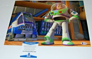 TIM ALLEN SIGNED (TOY STORY) MOVIE 11X14 (BUZZ LIGHTYEAR) *PROOF* BECKETT BAS #1  COLLECTIBLE MEMORABILIA