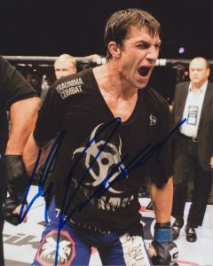 LUKE ROCKHOLD SIGNED UFC 8X10 PHOTO COLLECTIBLE MEMORABILIA