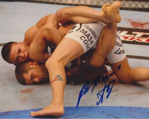 RICK STORY ‘THE HORROR’ SIGNED UFC 8X10 PHOTO 2 COLLECTIBLE MEMORABILIA