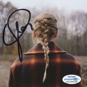 TAYLOR SWIFT “EVERMORE” AUTOGRAPH SIGNED CD BOOKLET + CD C ACOA COLLECTIBLE MEMORABILIA