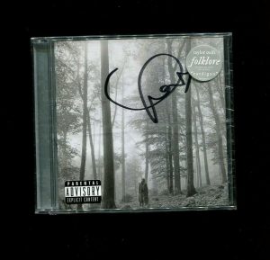 TAYLOR SWIFT signed autographed “FOLKLORE” CD FROM RECORD LABEL SEALED & IN HAND