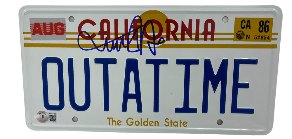 MICHAEL J FOX SIGNED BACK TO THE FUTURE OUTATIME LICENSE PLATE AUTOGRAPH BAS 20